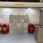 Armani modular sustainable exhibition stand with silver and red gradient finish