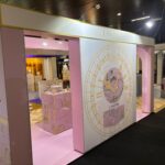 Lancôme sustainable exhibition stand in pink and gold, built with T3 modular system
